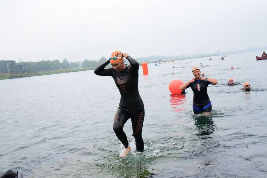 Hayley Standen leaving the water during a triathlon swim